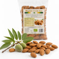 Migdale crude RAW BIO 150g — migdale crude și ramură migdal cu frunze, prezentare lifestyle, Biovicta