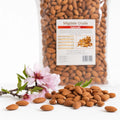 Migdale naturale 1000g — migdale crude și ramură migdal cu flori roz, prezentare lifestyle, Biovicta