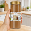Scorțișoară Ceylon pudră BIO 120 g, borcanul ținut în mână, mărime reală, Biovicta